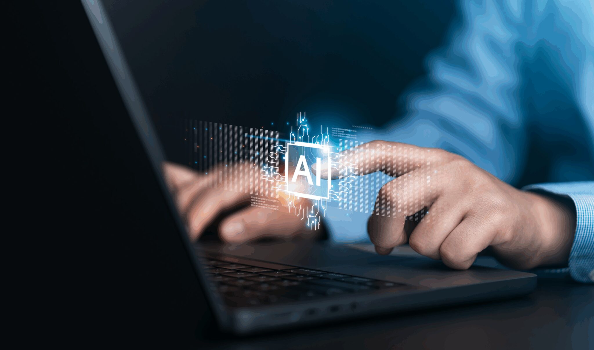 Person interacting with AI on laptop.